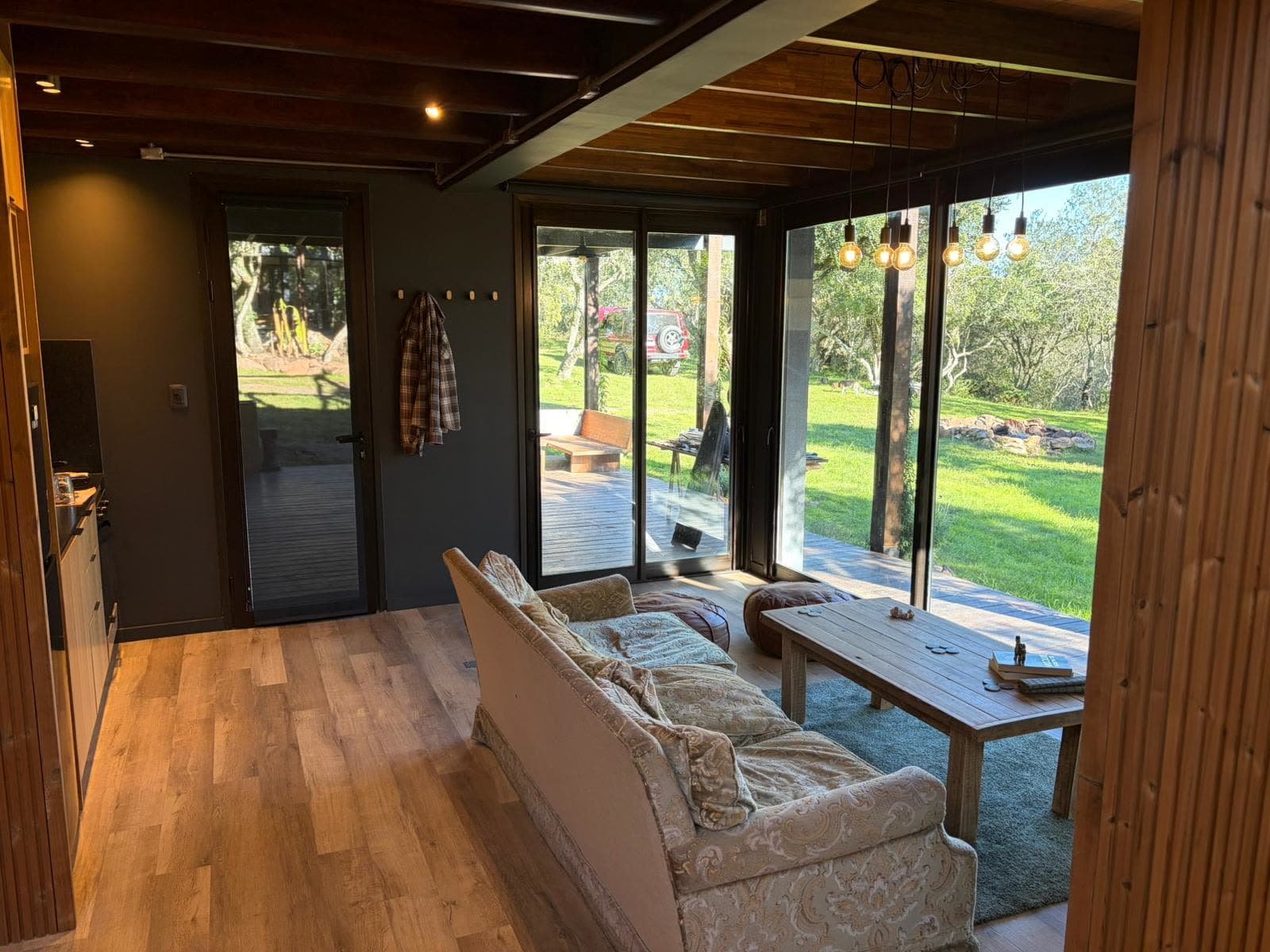 Villa Serrana — The living room opening onto the garden