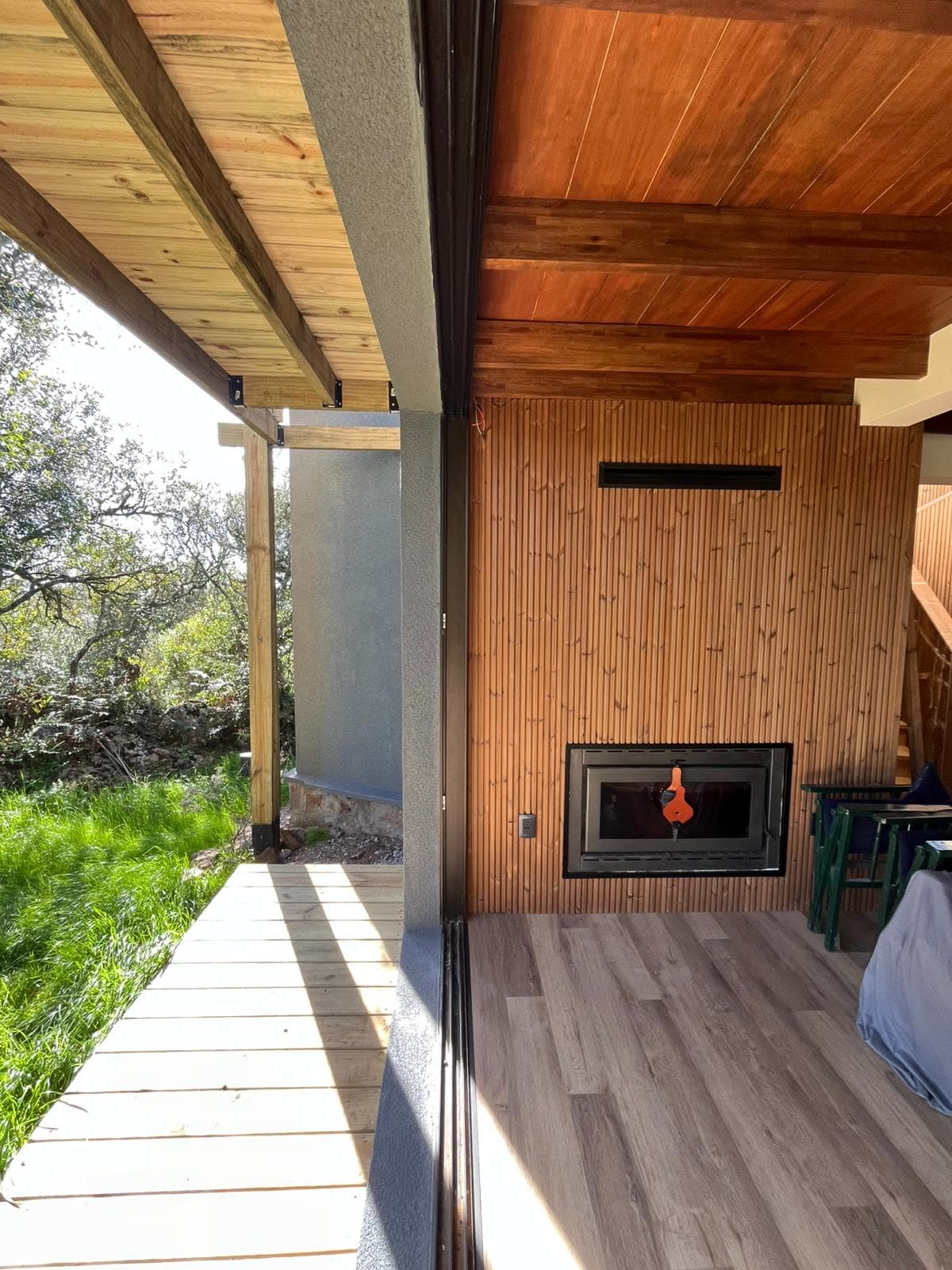 Villa Serrana — Side gallery and wood stove