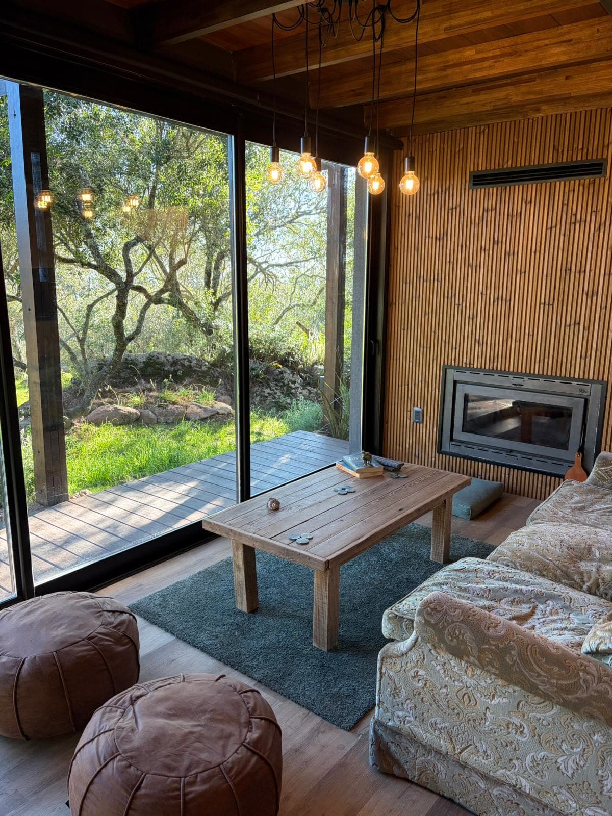 Villa Serrana — Living room with wood stove